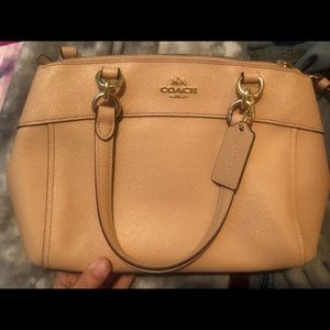 Pretty medium sized Coach bag with long strap